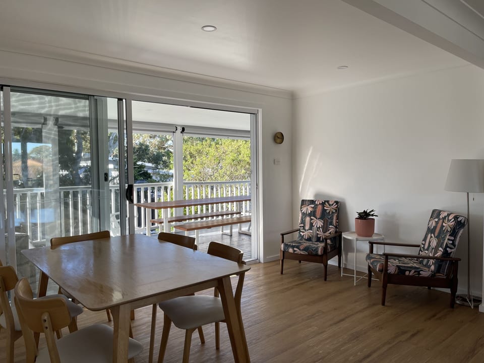 Upstairs dining area which opens up onto balcony