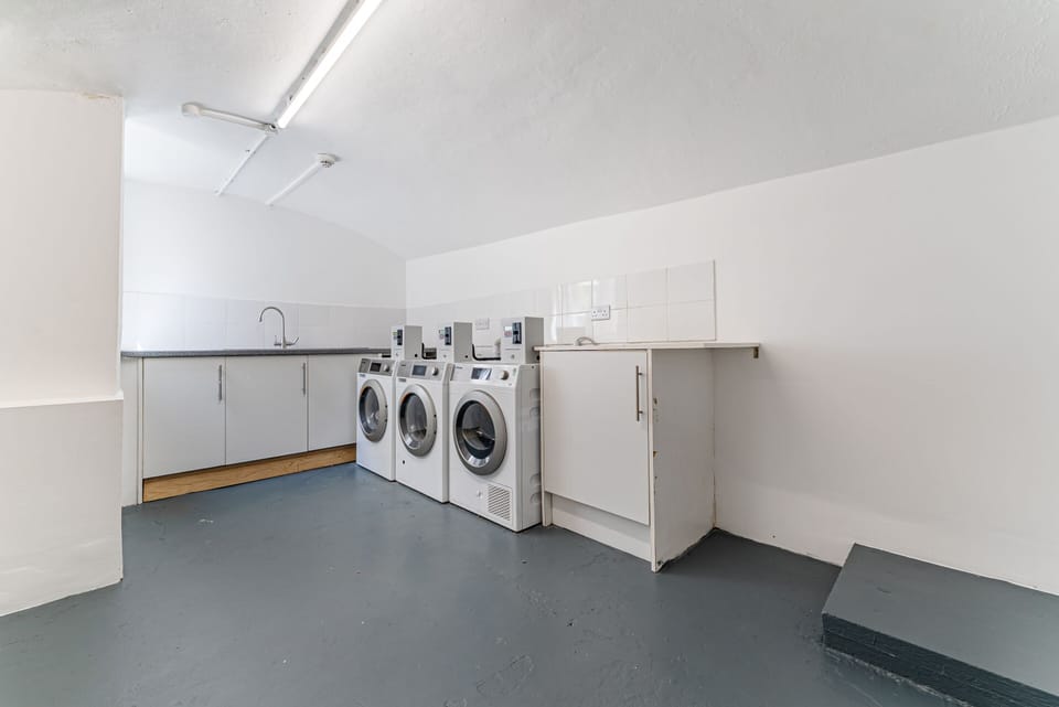 Well-equipped laundry room facilities available for guest convenience and comfort.