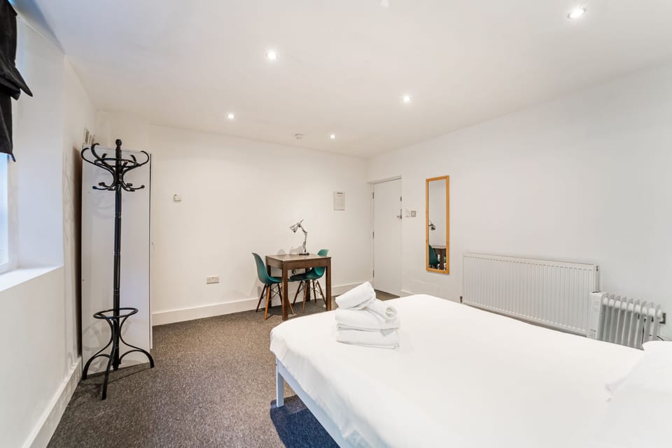 A spacious private room offering comfort and privacy for a relaxing stay.