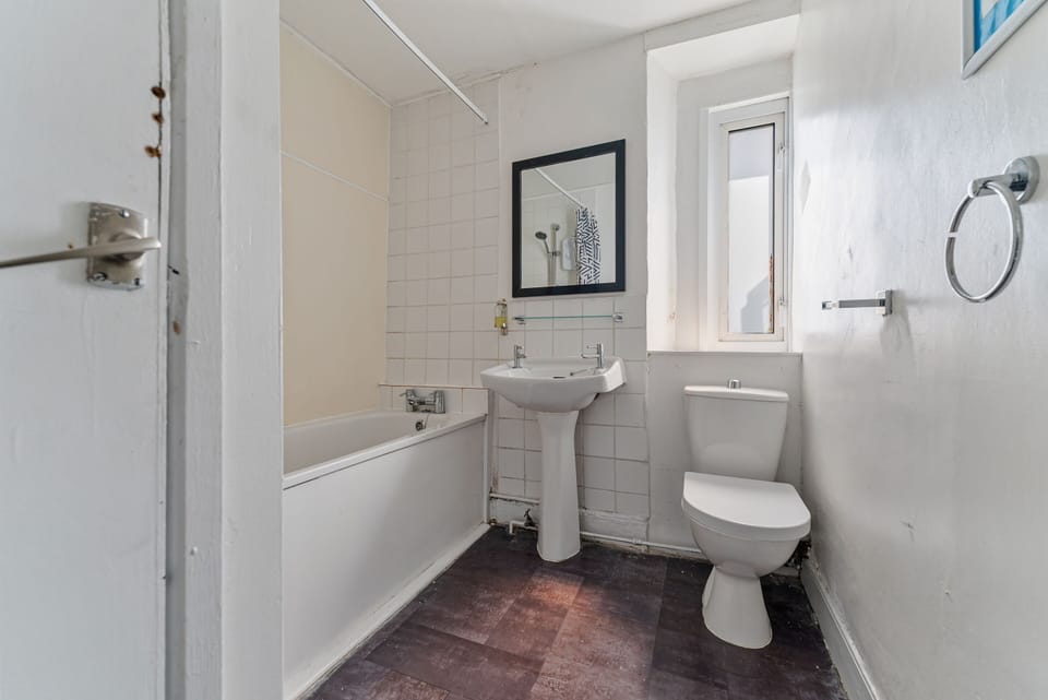 Shared bathroom facility available for guests, offering convenient access and comfort during your stay.