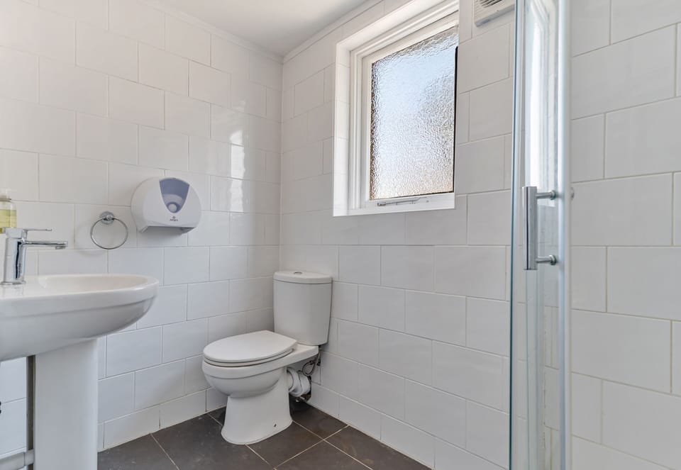 Shared bathroom for convenient, budget-friendly stays.