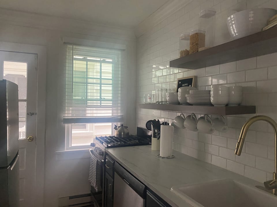Updated kitchen with all new stainless steel appliances, including dishwasher.