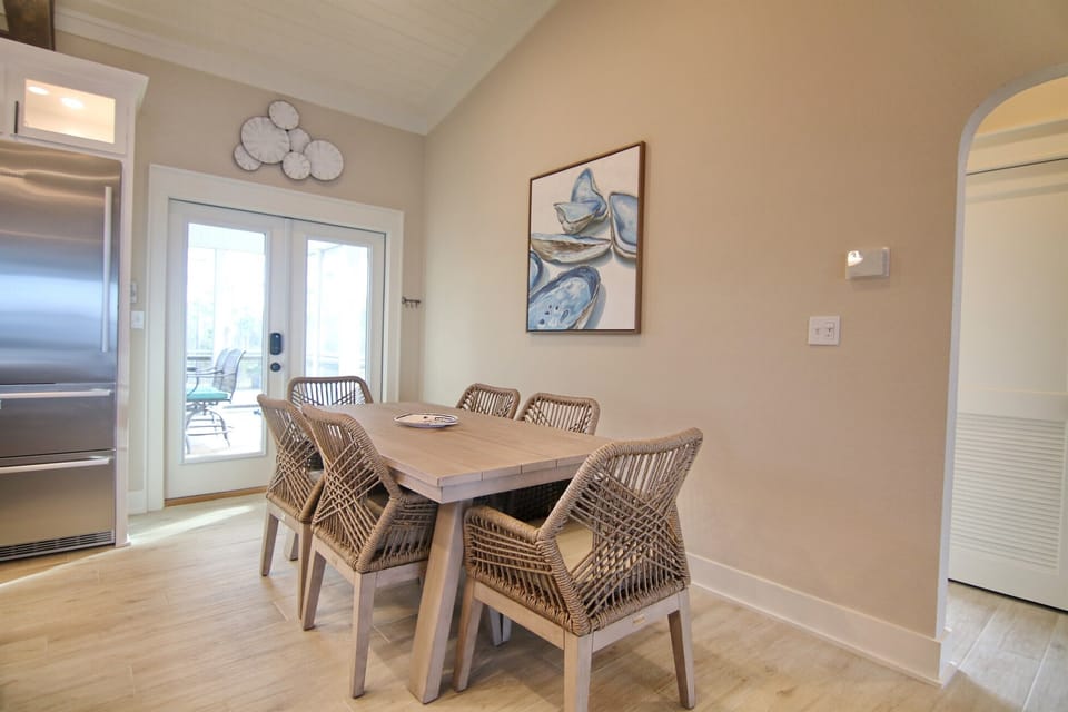 Eating area adjacent to large island in kitchen. 