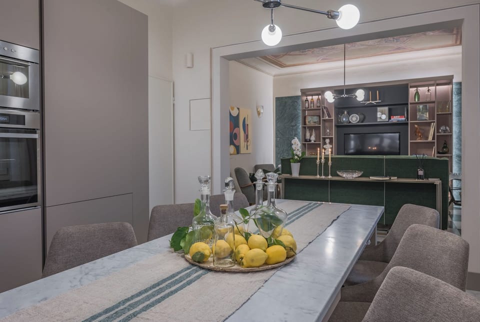 The spacious and bright fully furnished and equipped kitchen (at night)