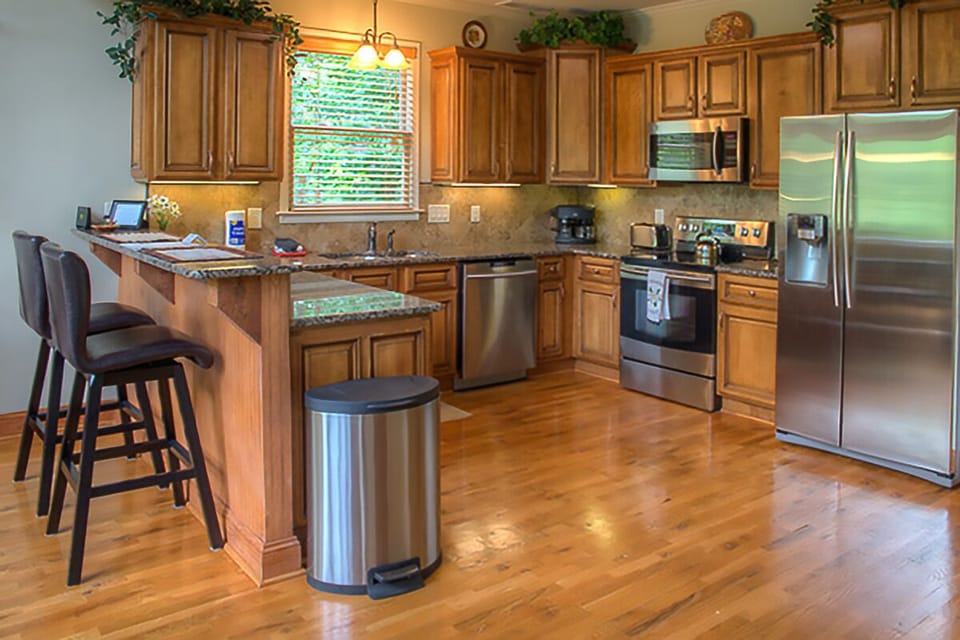Large kitchen with stainless steel appliances