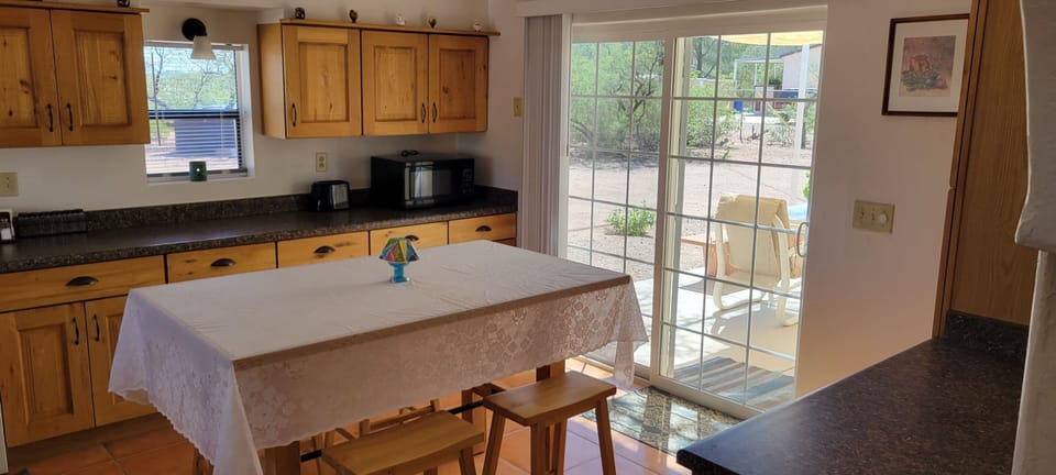 kitchen, back door to back porch and kitchen table