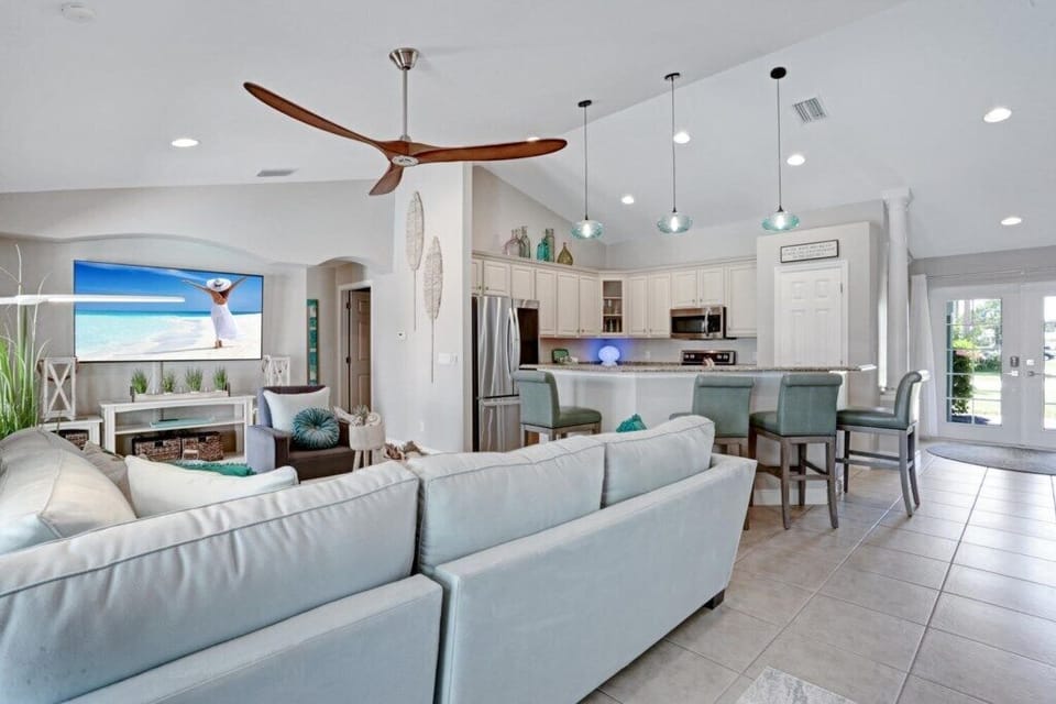 Open-concept living area with modern kitchen and cozy seating for relaxation.