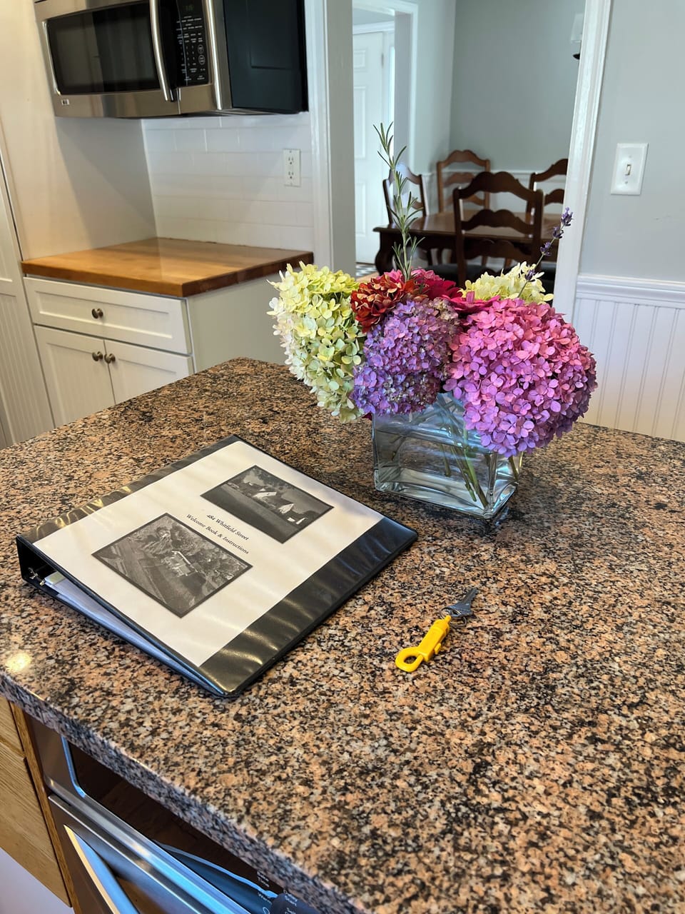You'll arrive to a welcome book and key on the island.  Flowers too if I can.