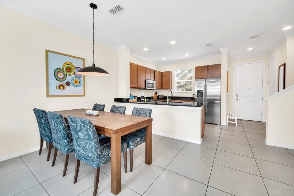 Dining area overlooking large open kitchen