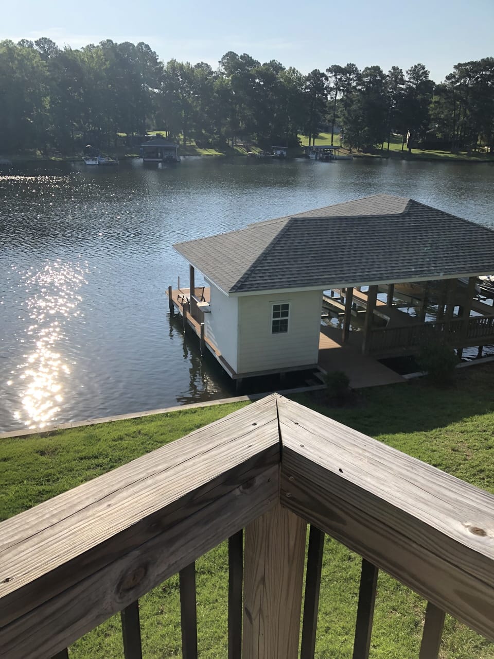 Boathouse - close walk and subtle slope to lake. Boat slip and lift-4000lbs max.