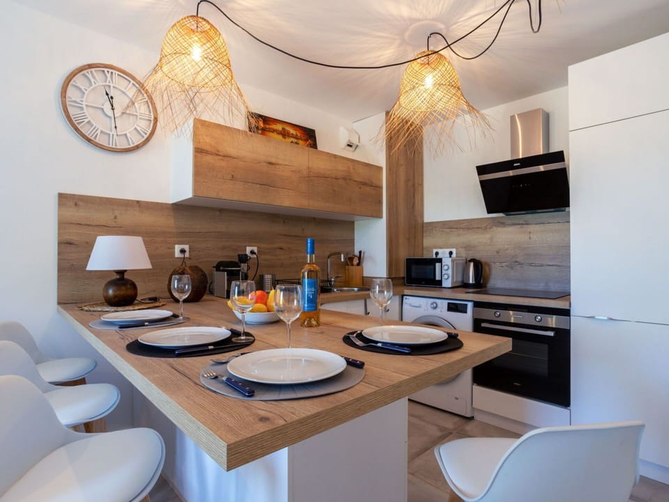 Table, Furniture, Property, Cabinetry, Countertop, White, Chair, Dishware, Wood, Tableware