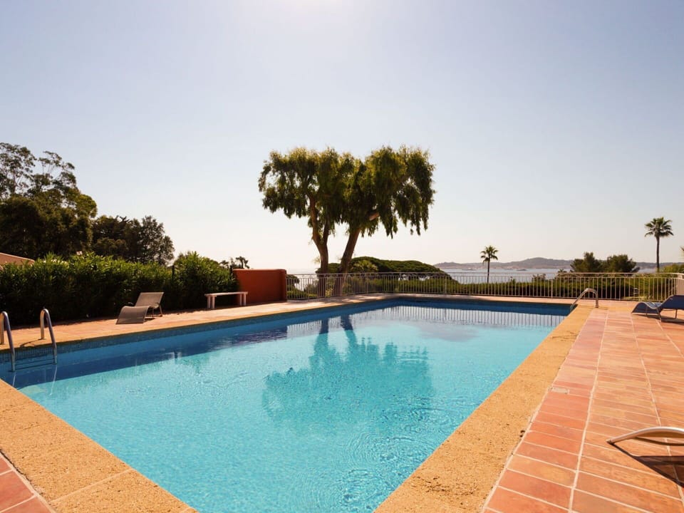Water, Sky, Plant, Property, Swimming Pool, Azure, Tree, Shade, Body Of Water, Residential Area