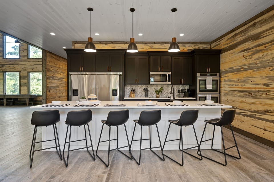 Kitchen Paradise: Whip up culinary delights in this stylish, modern kitchen with ample seating!
