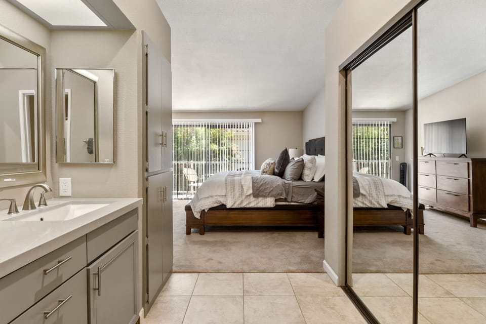 Primary bedroom, closet and vanity area
