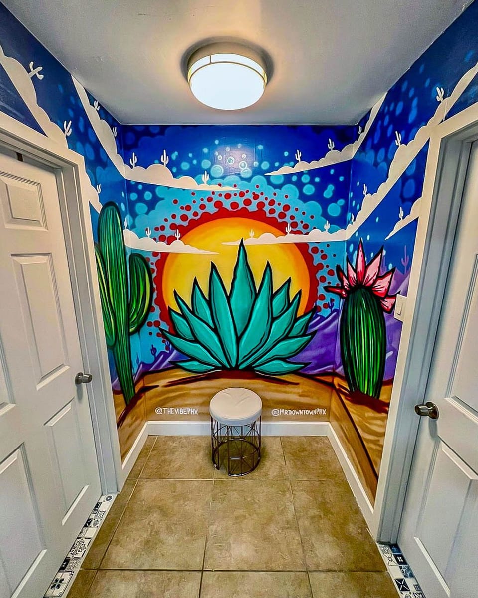 Snap a selfie with friends in front of this agave-themed desert mural