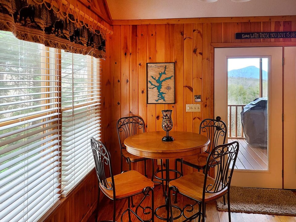 Dining with a view - door steps out to covered back porch