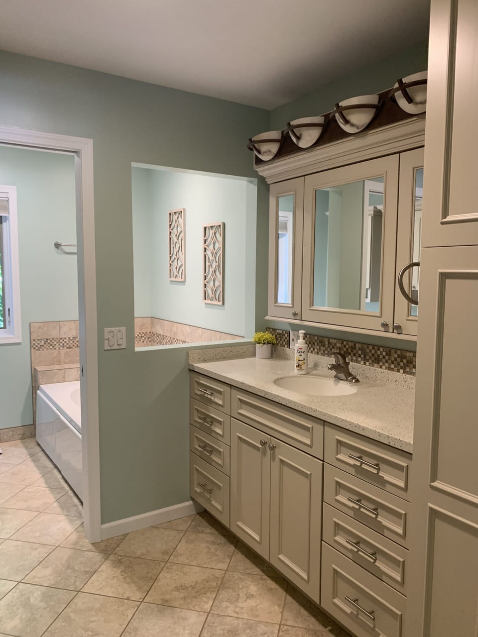 Master Bath with tile shower, nice jacuzzi tub, and bidet adjacent to toilet.