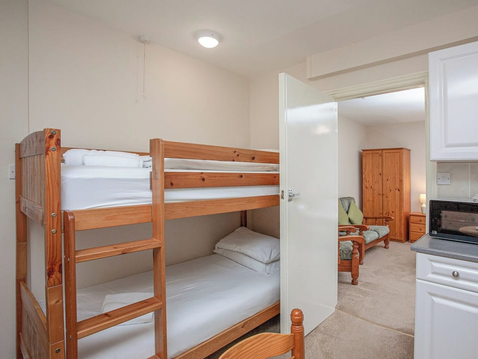 Bunk bedroom | Apartment Five - Broadshade Holiday Apartments, Paignton