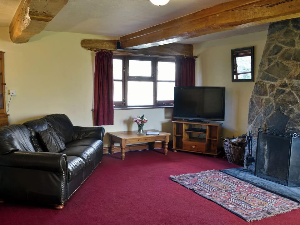 Warm and welcoming living room | Tarragon - Sherrill Farm Holiday Cottages, Dunterton, near Tavistock