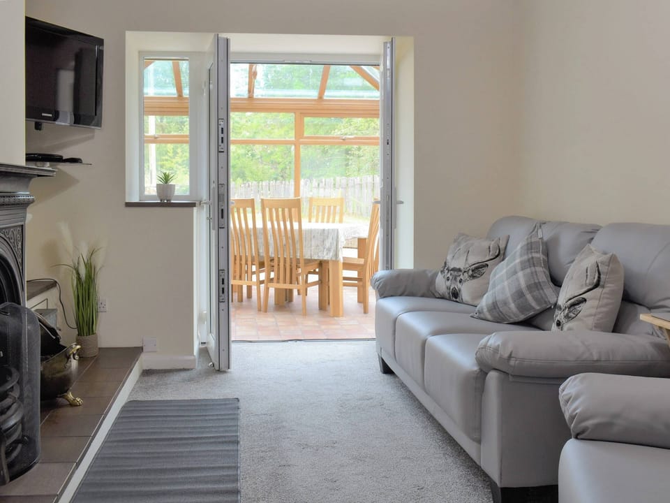 Living room | The Coach House - Caernarfon Cottages, Bethel, near Snowdon