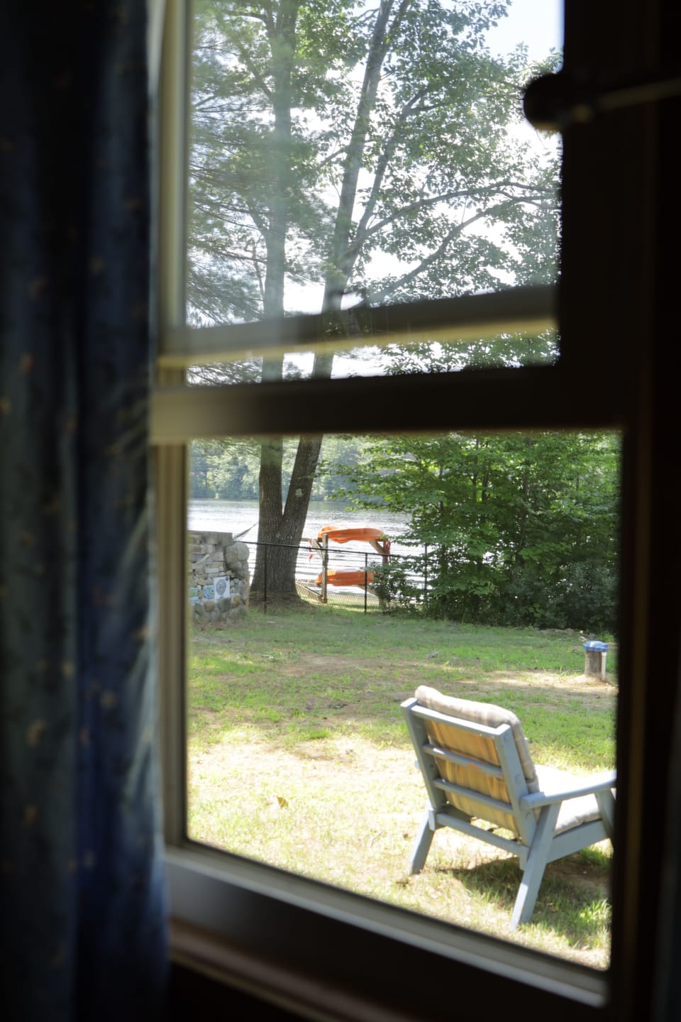 Enjoy the panoramic view of the waterfront and the open fire pit.