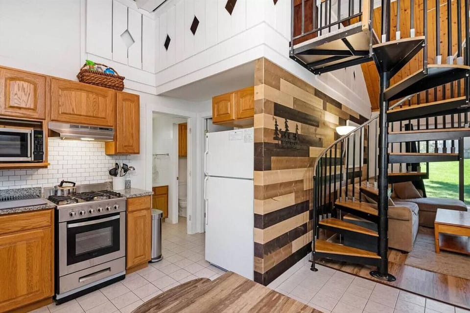 Kitchen showing and spiral staircase entrance