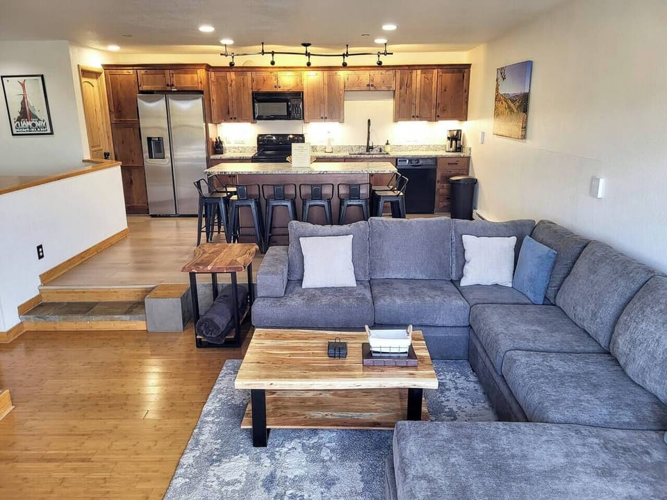 Living Room with split level kitchen. 