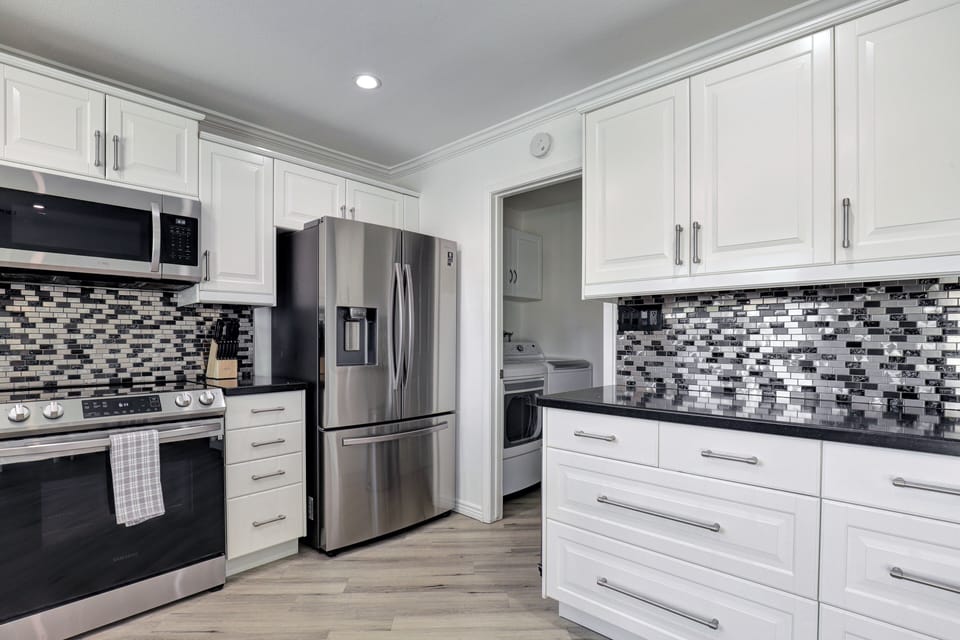 Kitchen has all the essentials and stainless appliances