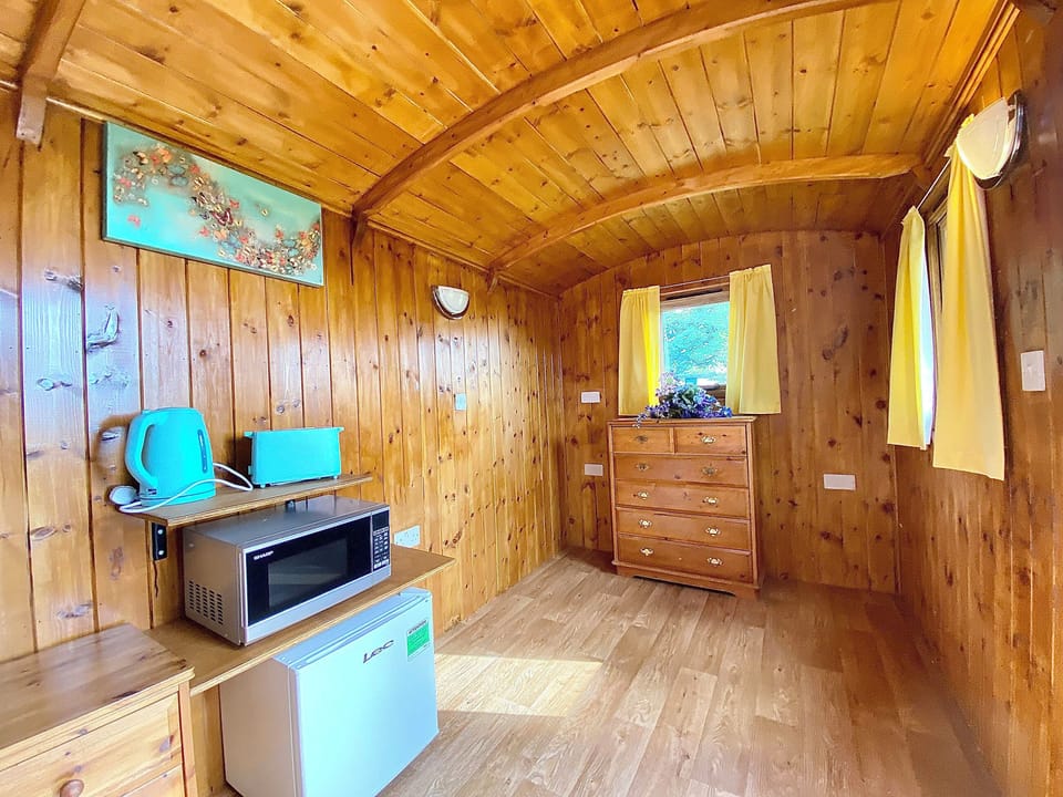 Open plan living space | Ivy Shepherds Hut - Chelworth Shepherds Huts , Cricklade