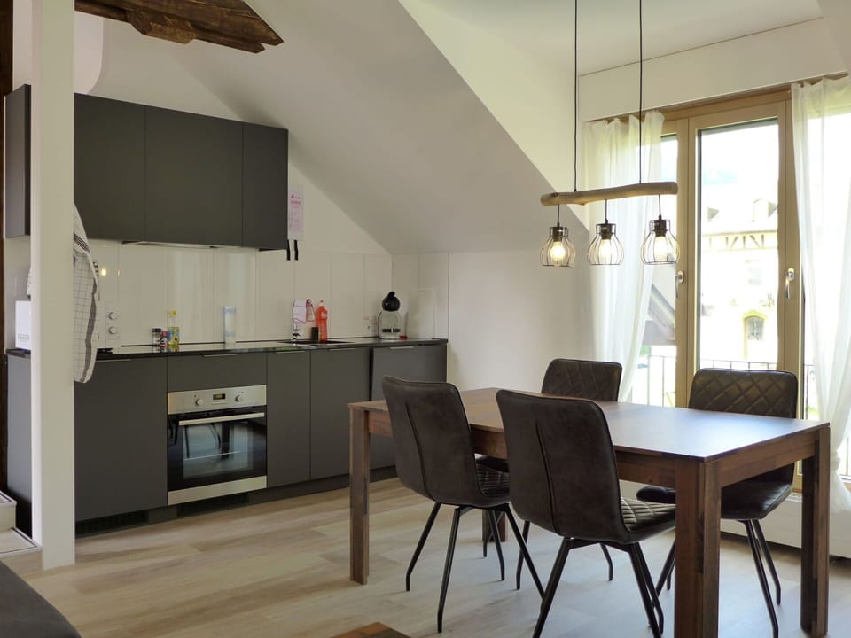 Table, Furniture, Cabinetry, Countertop, Chair, Building, Wood, Kitchen, Flooring, Interior Design
