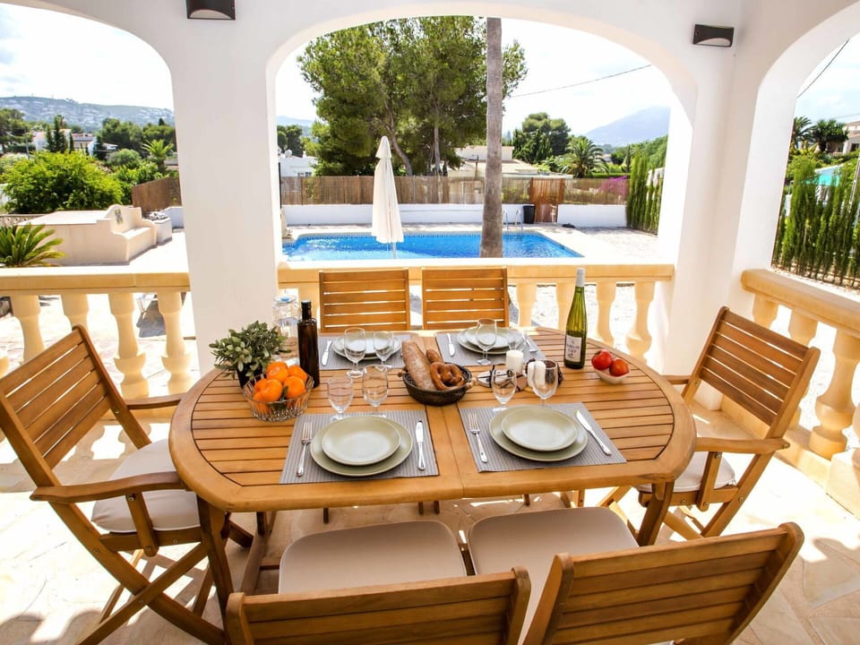 Table, Furniture, Water, Property, Chair, Flowerpot, Plant, Building, Azure, Tableware