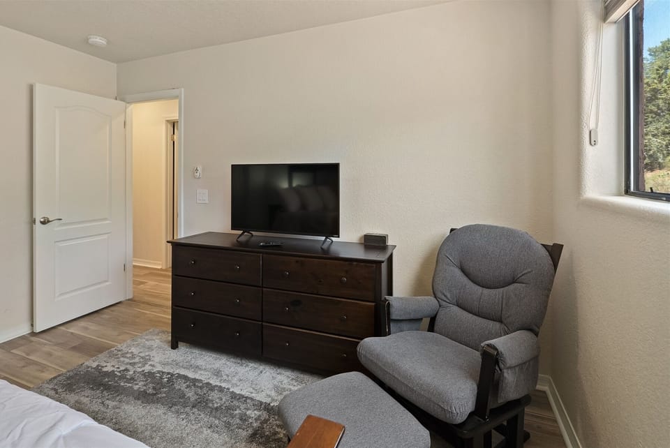 There`s an occasional chair and TV