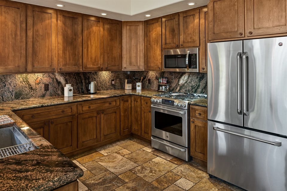 The kitchen is modern and fully-equipped