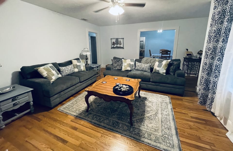 Nice living room w/ sleeper sofa (w upgraded mattress) & access to outside