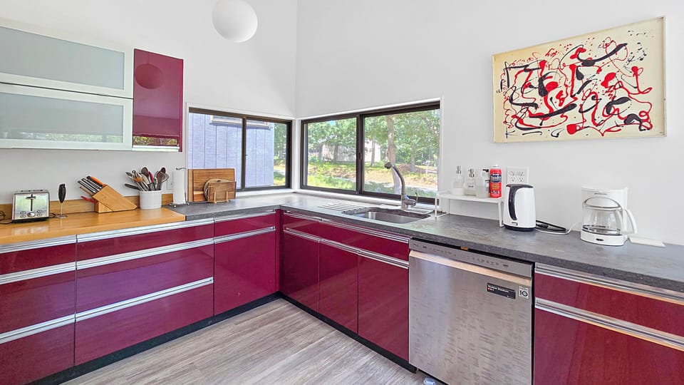 Nicely equipped kitchen with stainless appliances