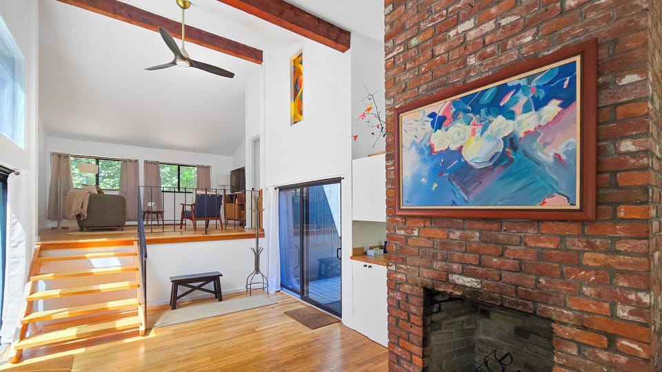 Looking towards the steps to the second floor and living room
