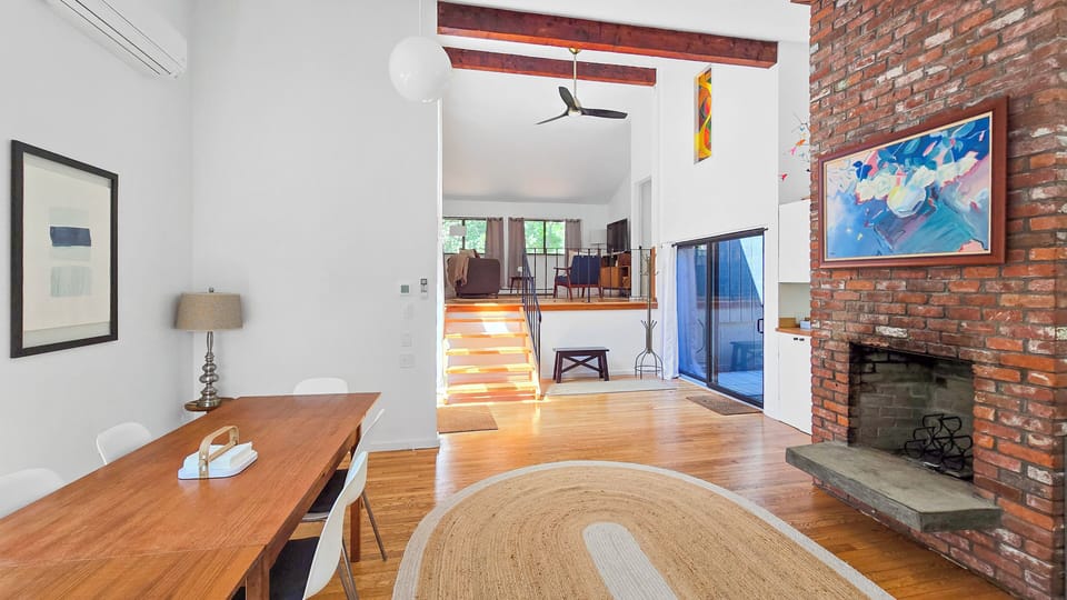 Looking towards the steps to the second floor and living room