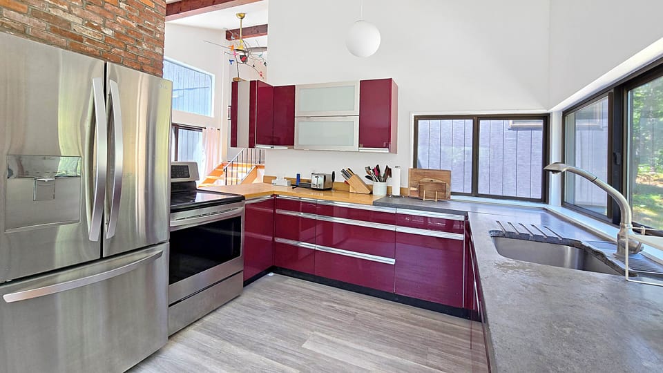 Nicely equipped kitchen with stainless appliances