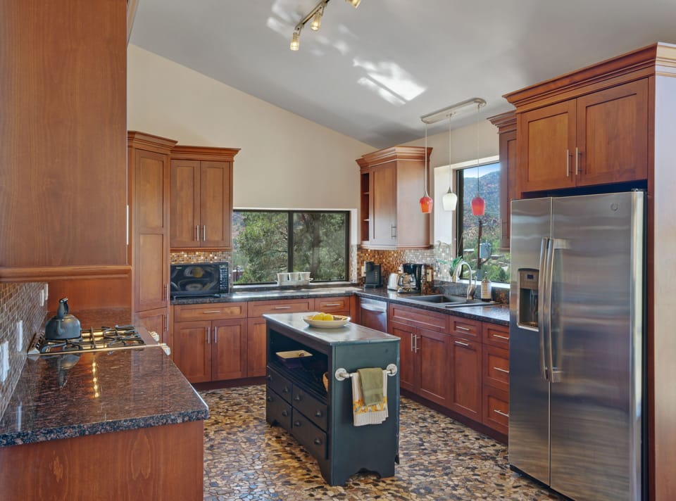 Fully stocked kitchen with incredible views