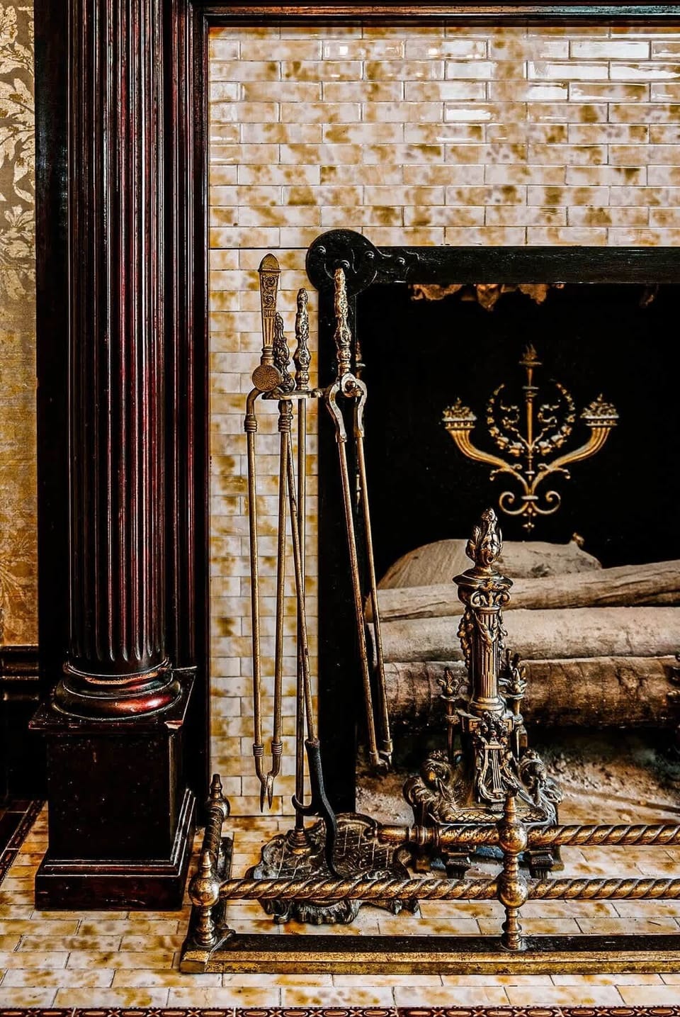 A uniquely designed fireplace located in the foyer of the Curry Mansion Inn.