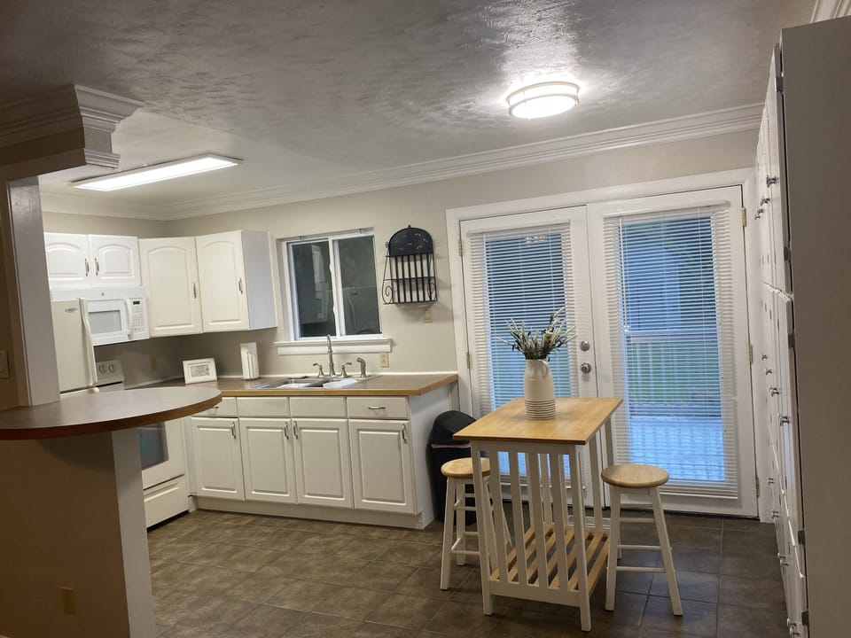 Kitchen and Dinette with deck doors