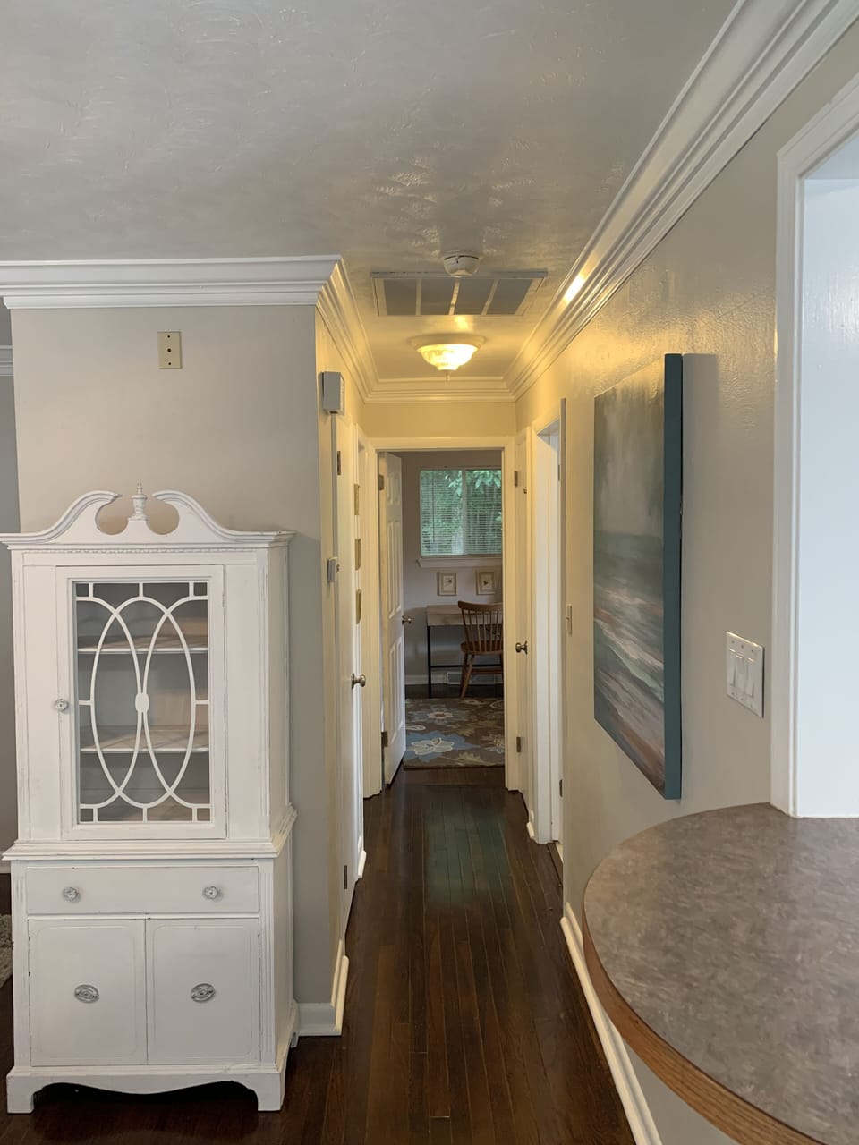 Hallway to bathroom and bedrooms.