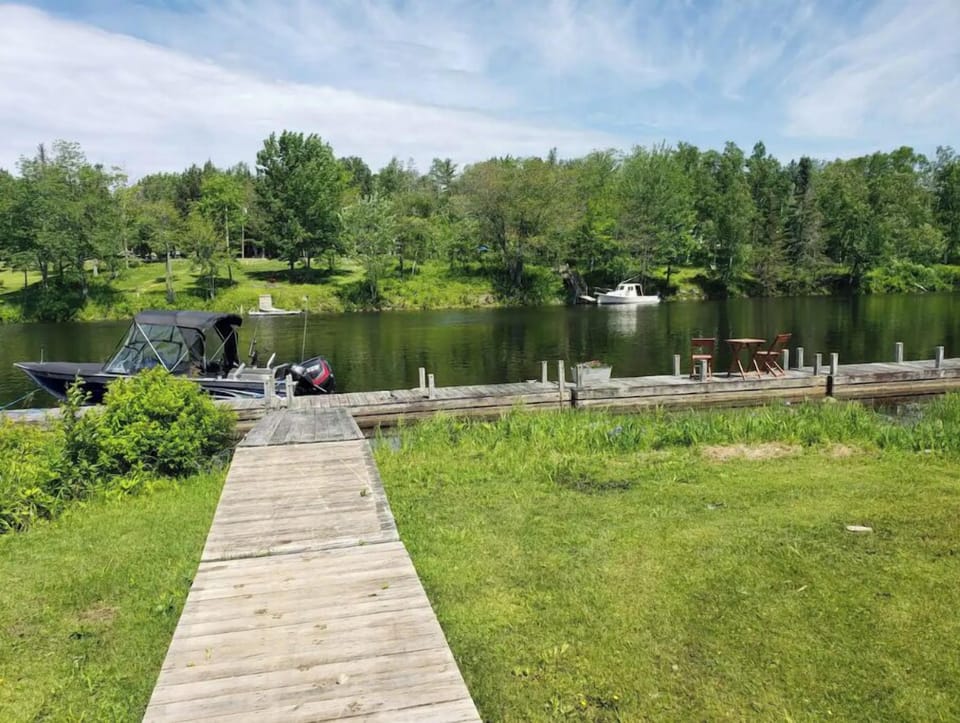 Our boat and dock on Moose River