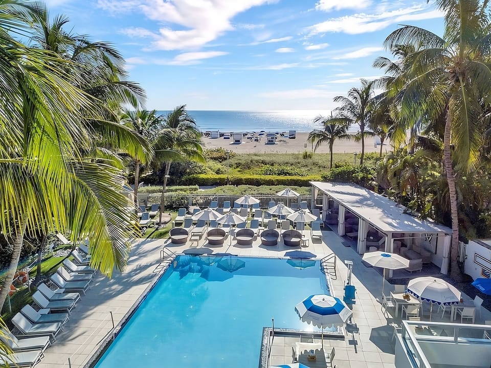 Soak up ocean breezes beside the sparkling resort pool.