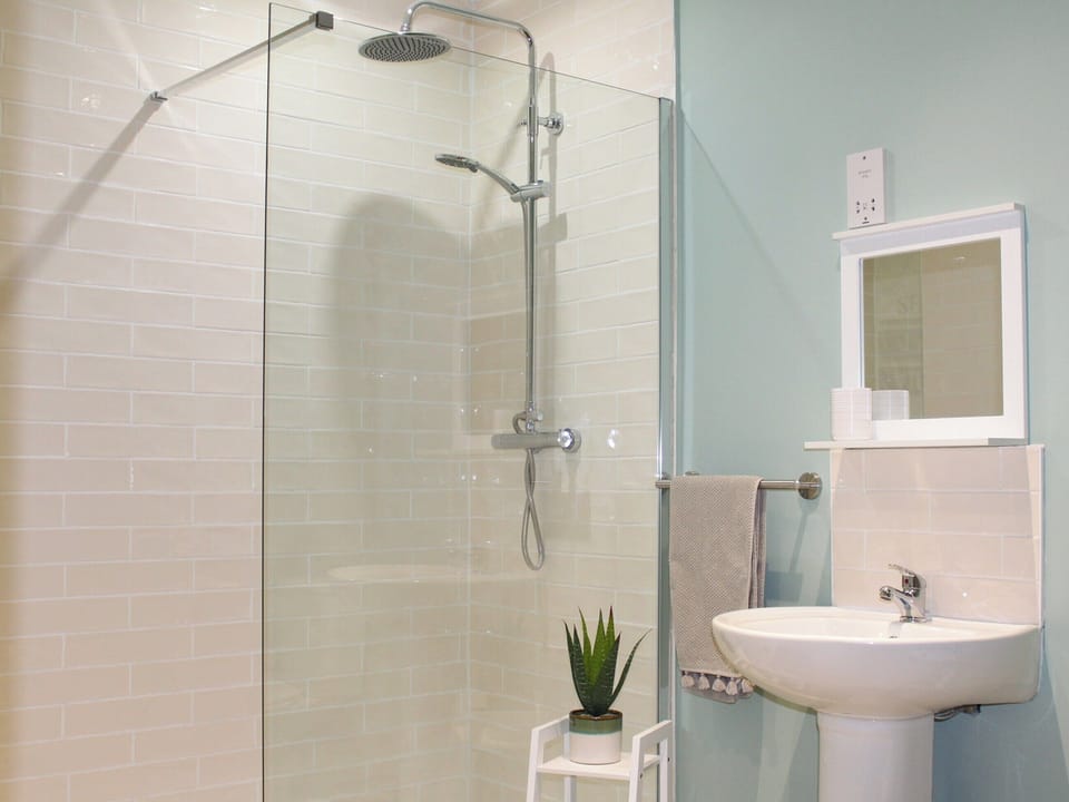 Shower room | Seaview Cottage - Bron Y Wendon Holiday Park, Llanddulas, near Llandudno