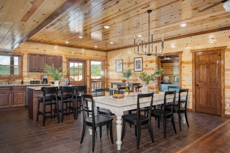 Interior dining table seats 8, with additional seating at the kitchen island.