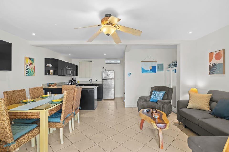The open concept space opens to the spacious terrace.
