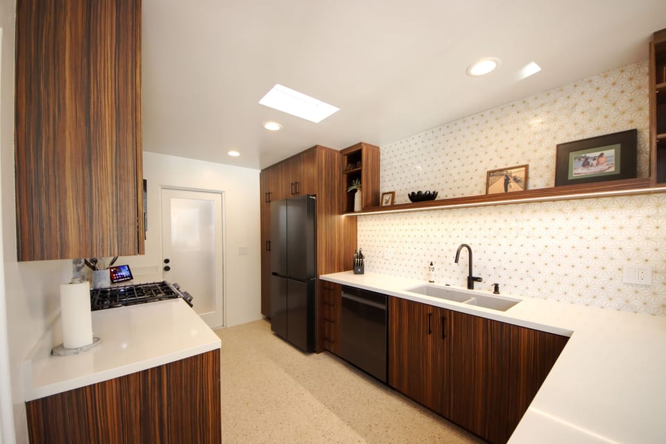 Newly remodeled kitchen with all smart appliances and skylight.