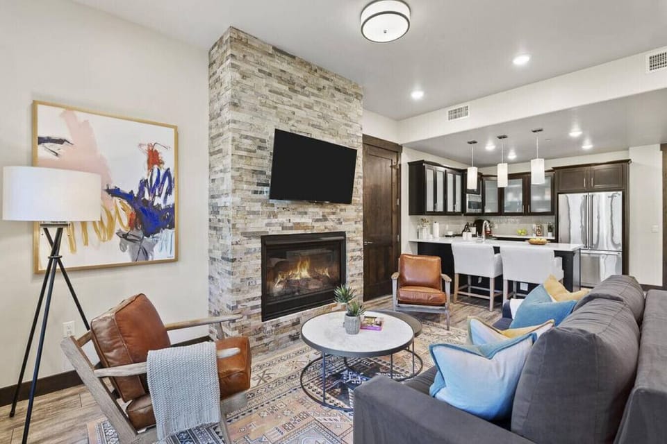 Spacious living room w/fireplace & smart TV