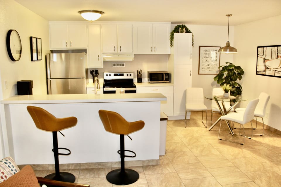 View of kitchen and dining area. 